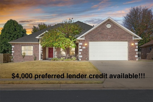 view of front of property with a garage