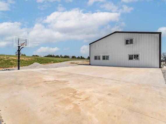 exterior space with basketball court