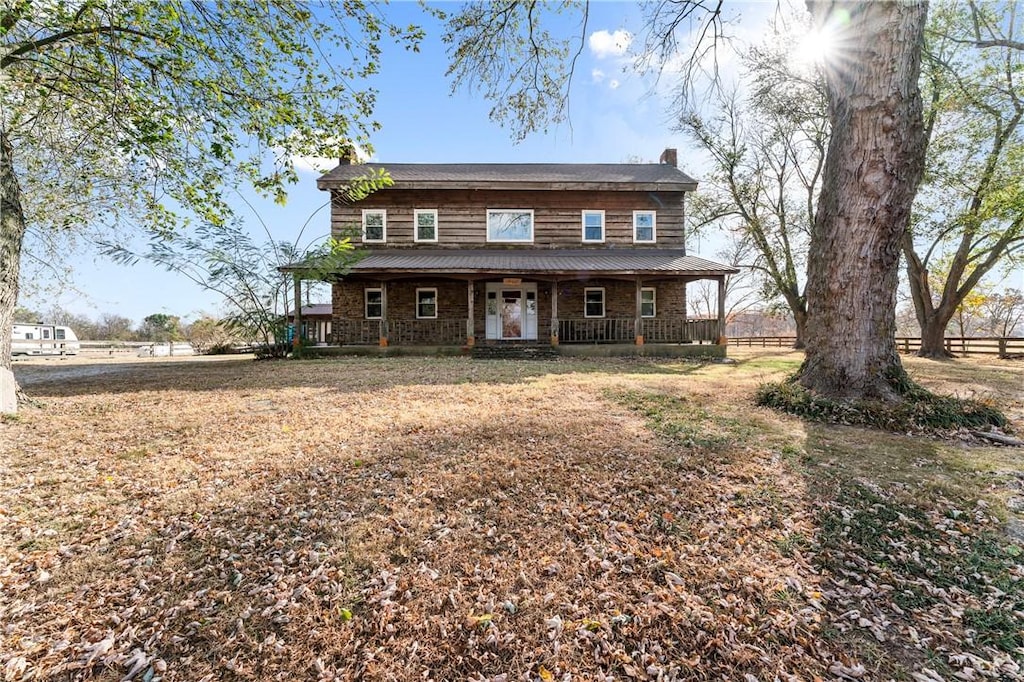 18405 Rheas Community Rd, Lincoln, AR 72744 - view of front of property featuring a porch and a chimney