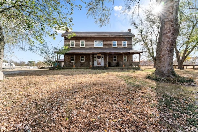 18405 Rheas Community Rd, Lincoln, AR 72744 - view of front of property featuring a porch and a chimney