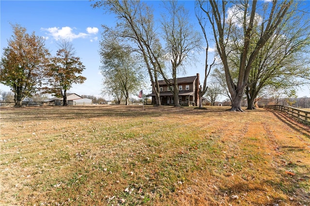 view of yard featuring a rural view