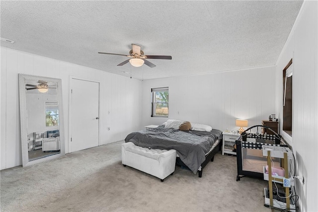 18405 Rheas Community Rd, Lincoln, AR 72744 - bedroom with a textured ceiling, carpet flooring, and ceiling fan