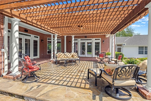 view of patio featuring french doors and a pergola