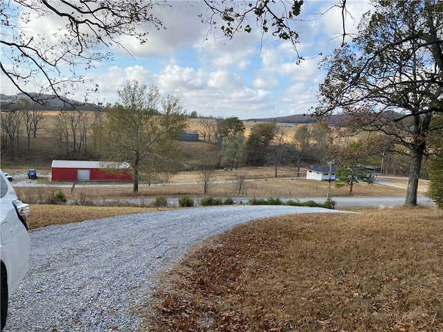 view of road featuring a rural view