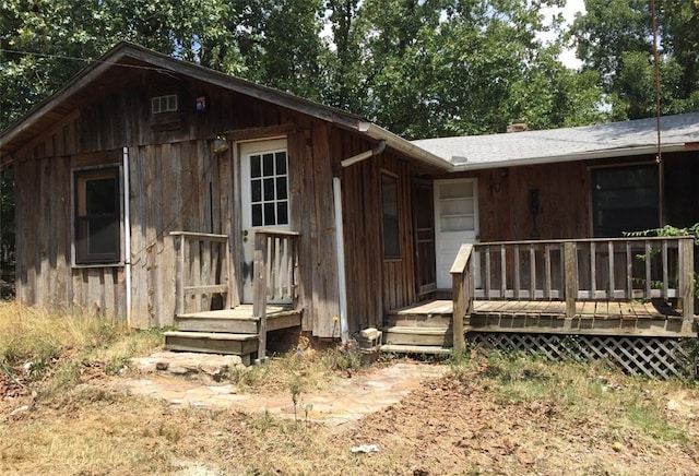 exterior space featuring a wooden deck