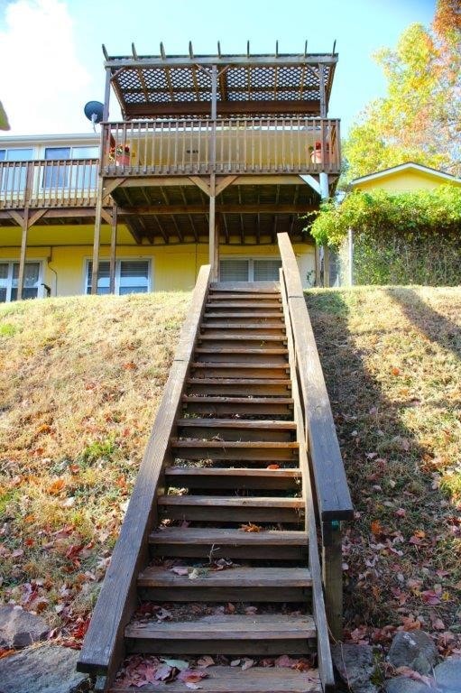 18960 Coppermine Rd, Rogers, AR 72756 - back of house with stairway