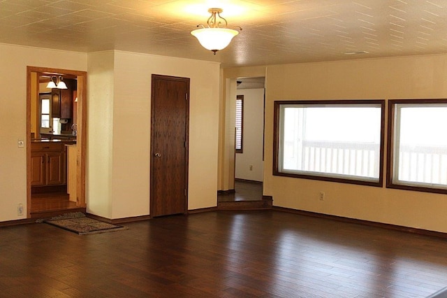 18960 Coppermine Rd, Rogers, AR 72756 - unfurnished room featuring baseboards and hardwood / wood-style floors
