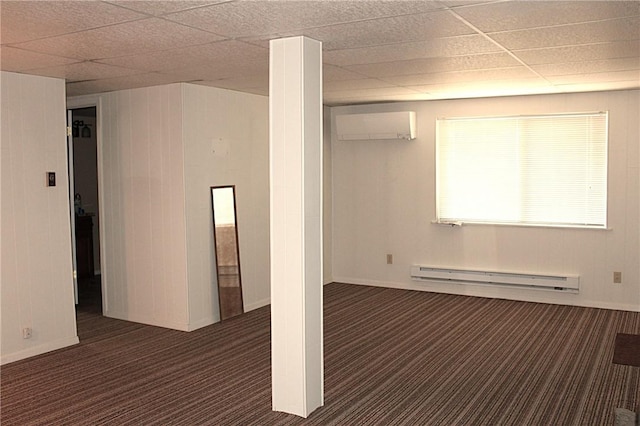 18960 Coppermine Rd, Rogers, AR 72756 - basement featuring carpet floors, a baseboard heating unit, a drop ceiling, and an AC wall unit