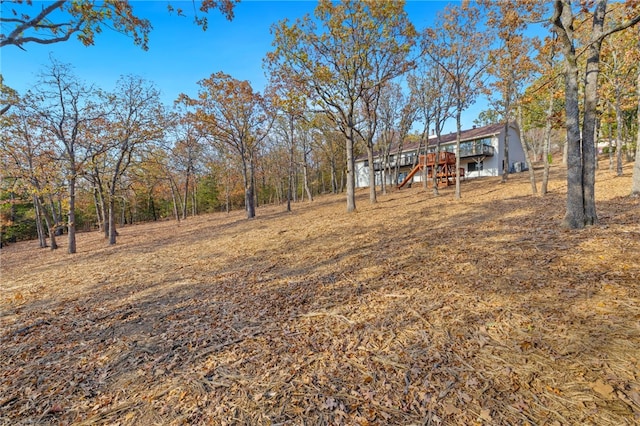 view of yard with a wooden deck