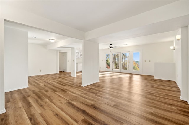 interior space featuring ceiling fan and light wood-type flooring