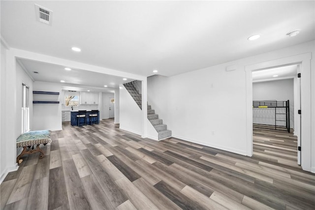 interior space with hardwood / wood-style floors