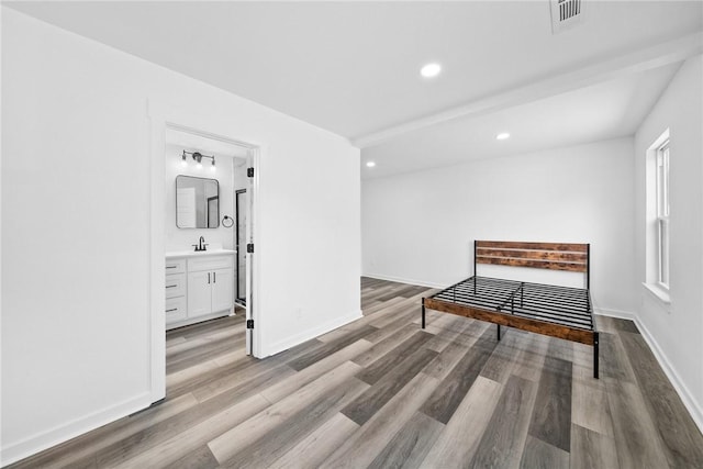 hallway with light wood-type flooring