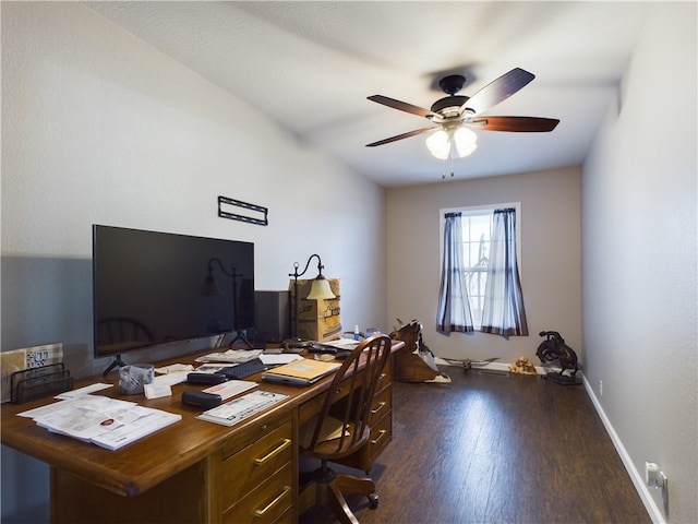 office with dark hardwood / wood-style flooring and ceiling fan