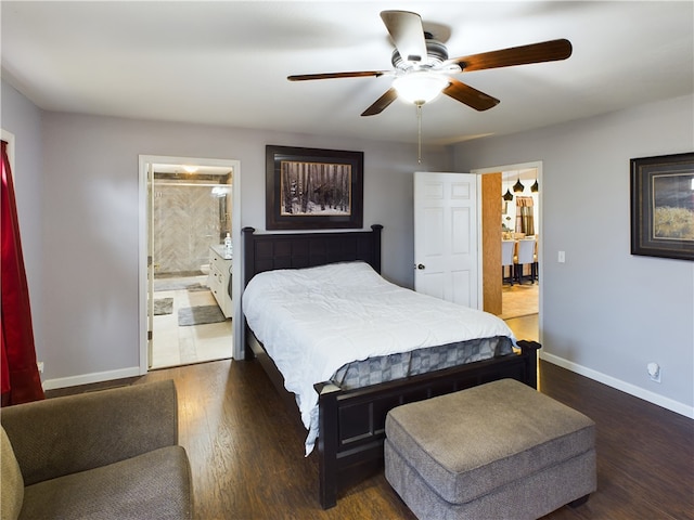 bedroom with ensuite bath, ceiling fan, and dark hardwood / wood-style floors