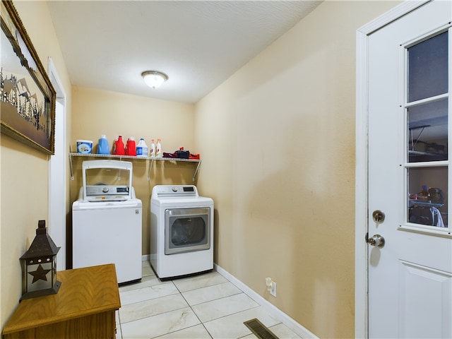 clothes washing area with independent washer and dryer