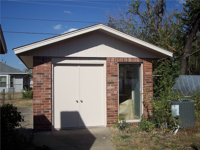 view of outdoor structure with central AC