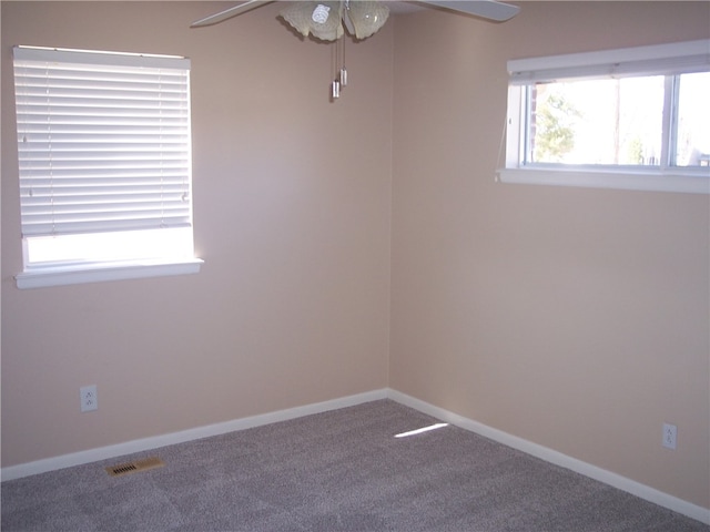 unfurnished room featuring carpet flooring and ceiling fan