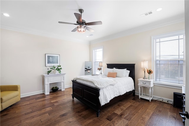 bedroom featuring ornamental molding, dark hardwood / wood-style floors, and ceiling fan