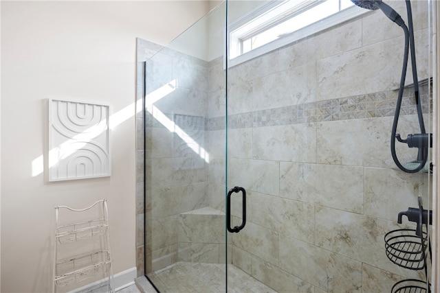 bathroom with an enclosed shower