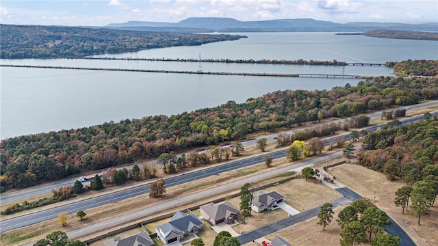 bird's eye view featuring a water and mountain view