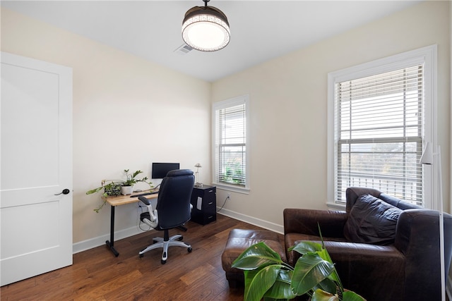 office area featuring dark hardwood / wood-style floors and a wealth of natural light