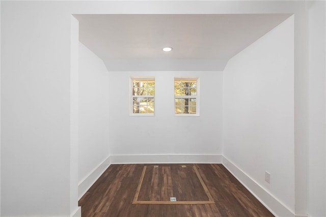 unfurnished room featuring dark hardwood / wood-style floors