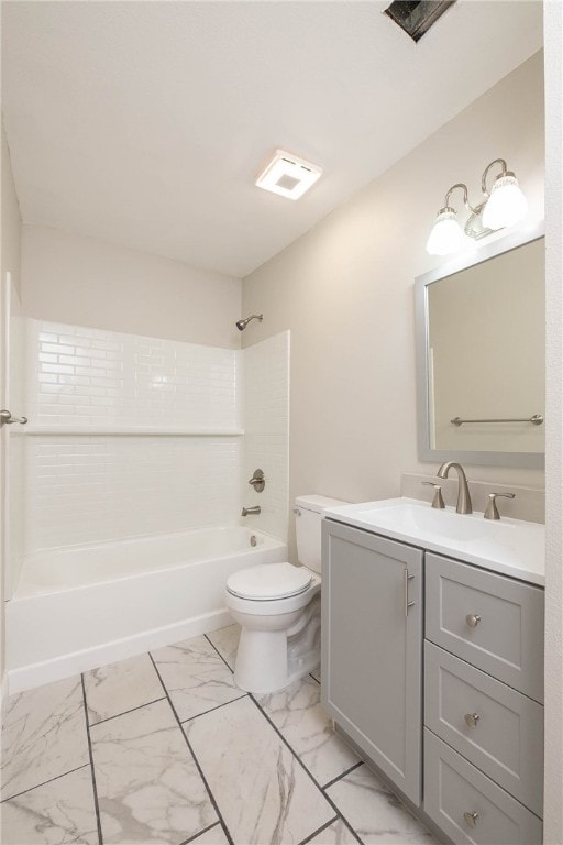 full bathroom with toilet, vanity, and washtub / shower combination