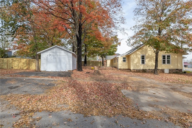 exterior space with a storage shed