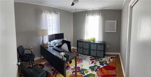 office area with a healthy amount of sunlight and hardwood / wood-style floors