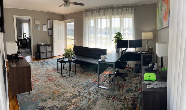 interior space featuring hardwood / wood-style flooring and ceiling fan