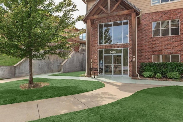 exterior space with a patio area and a yard