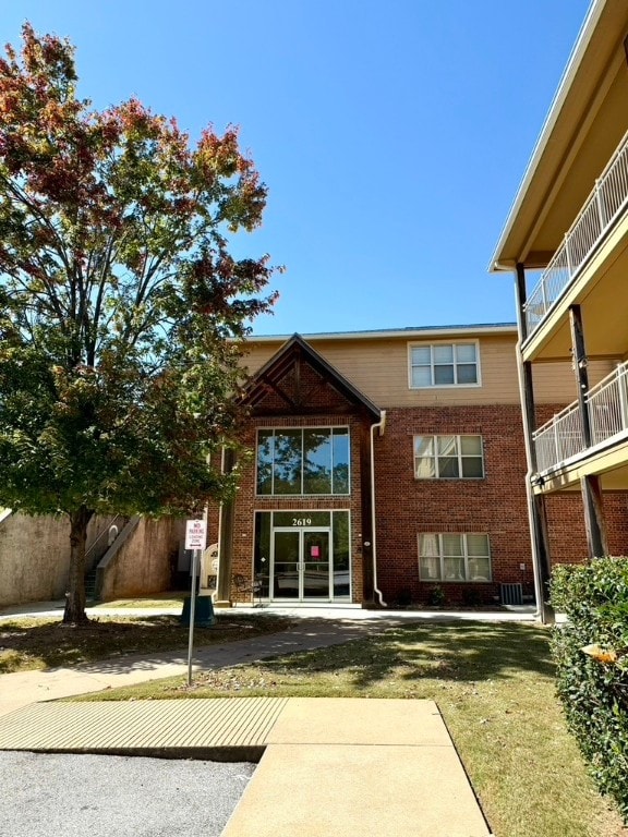 rear view of house featuring a balcony