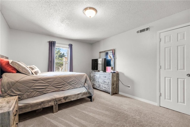 2841 E Hyland Park Rd, Fayetteville, AR 72701 - bedroom featuring light carpet, a textured ceiling, and baseboards
