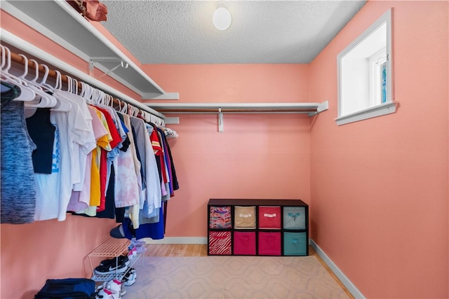 2841 E Hyland Park Rd, Fayetteville, AR 72701 - walk in closet with wood finished floors