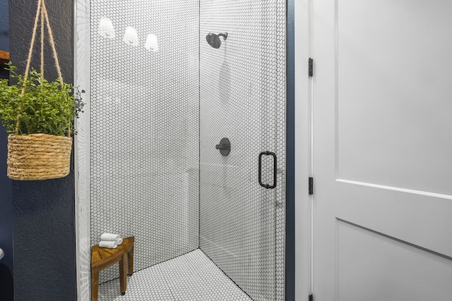 interior details featuring an enclosed shower