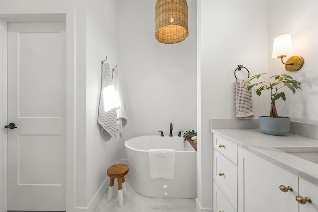 bathroom with a bathing tub and vanity