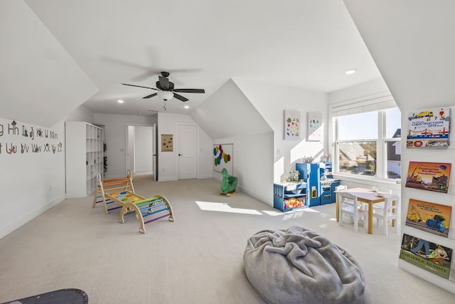 playroom featuring vaulted ceiling, carpet, and ceiling fan