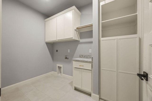 laundry area with washer hookup, cabinets, and hookup for an electric dryer