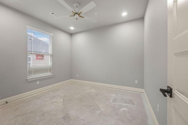 empty room featuring concrete flooring and ceiling fan