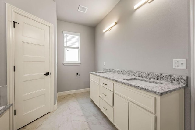 bathroom featuring vanity