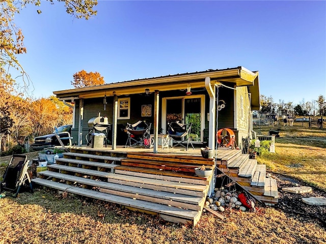 exterior space featuring a wooden deck