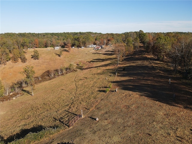 birds eye view of property featuring a rural view