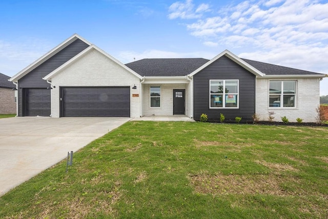 7762 Range Ave, Springdale, AR 72762 - view of front of house featuring an attached garage, a front lawn, concrete driveway, and brick siding