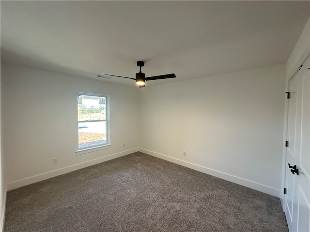 carpeted empty room with ceiling fan