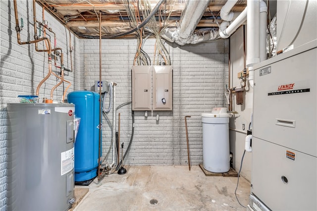 utility room featuring electric water heater and heating unit