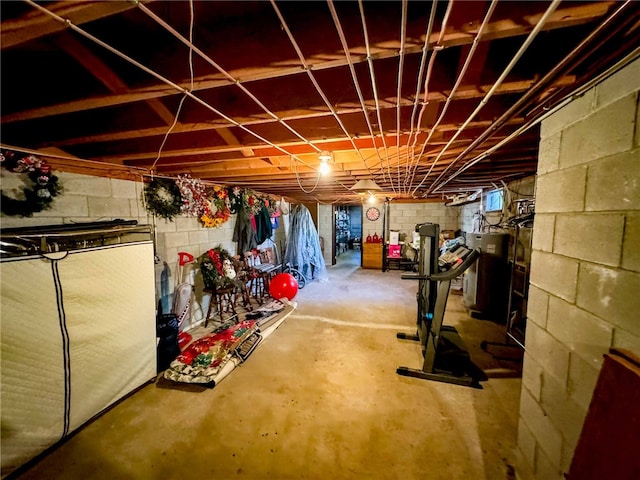 basement featuring electric water heater