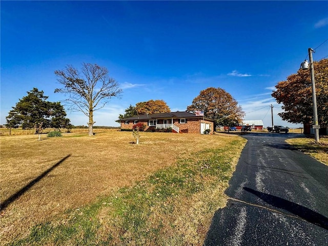 2514 B State Highway 97, Pierce City, MO 65723 - single story home with a front lawn, brick siding, and driveway