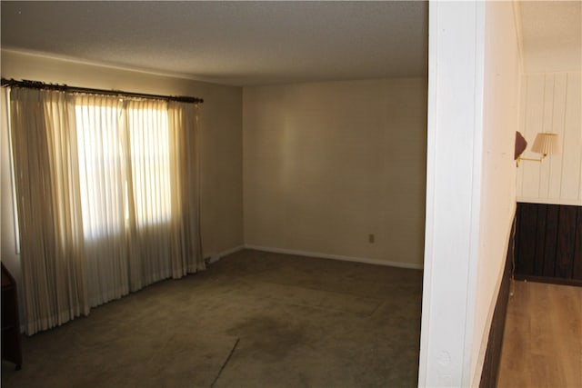 empty room featuring a textured ceiling