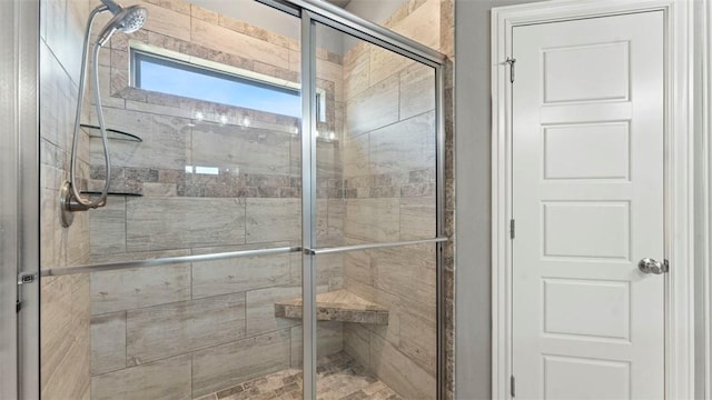 bathroom featuring a stall shower