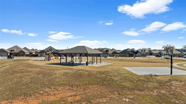 surrounding community featuring a gazebo, playground community, a residential view, and a lawn